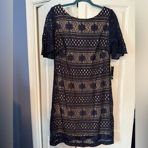 Julian Taylor dress and a size 8 a navy blue lace overlay. Brand new with tags.